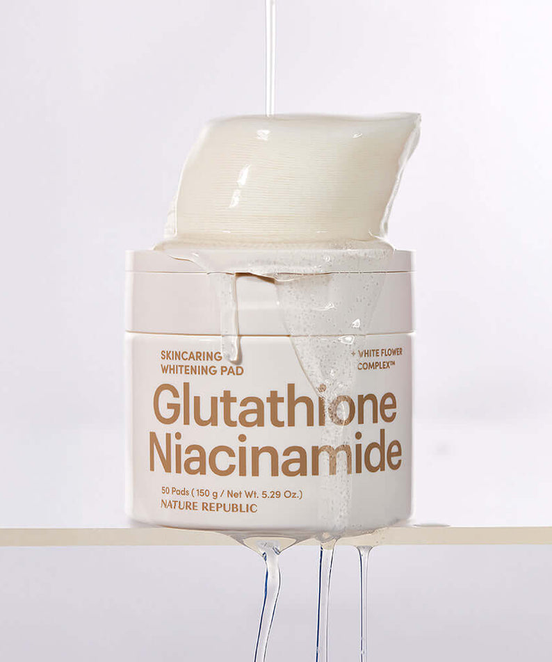 NATURE REPUBLIC Skincaring Whitening Pads 150g with Glutathione and Niacinamide featured in a white creamy texture.