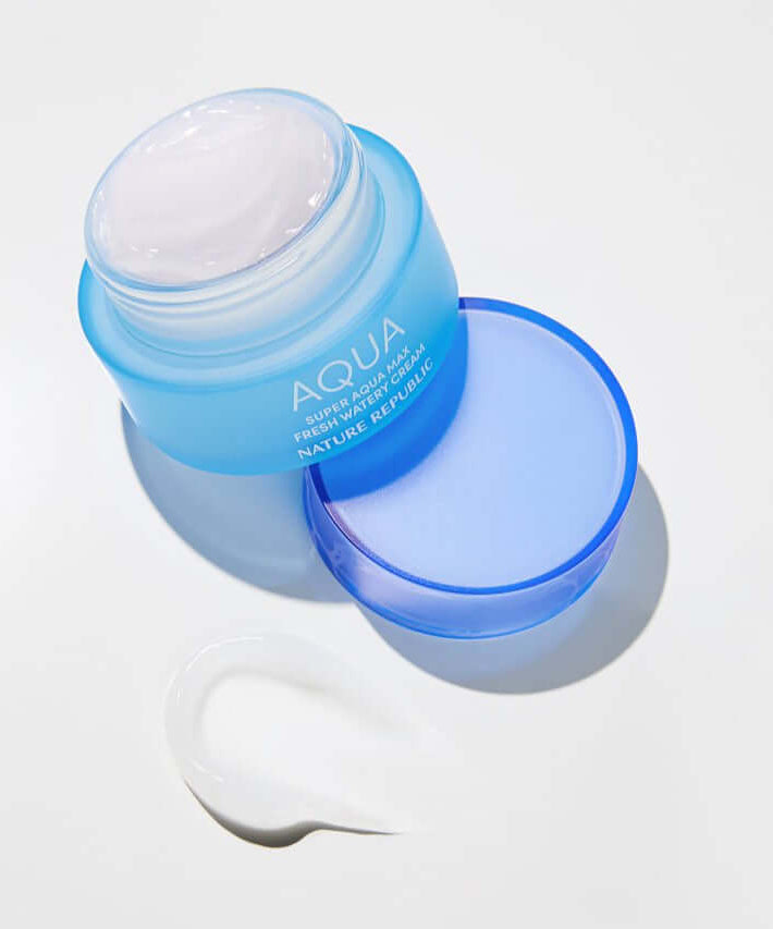 NATURE REPUBLIC Super Aqua Max Fresh Watery Cream 80ml in an open jar, showcasing its creamy texture on a white background.