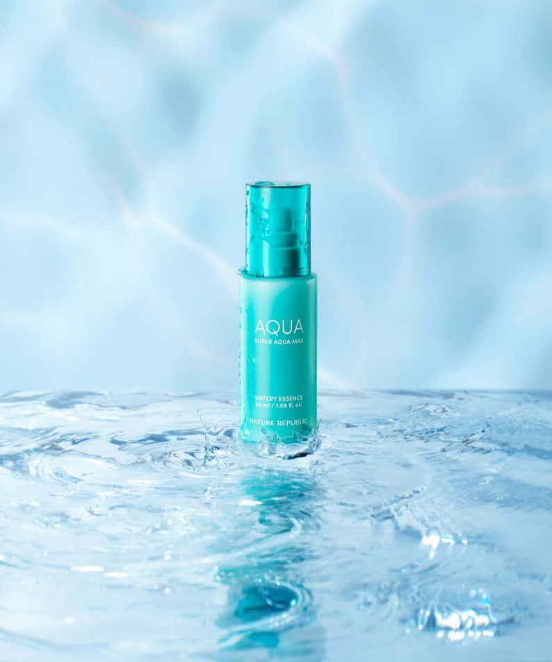 NATURE REPUBLIC Super Aqua Max Moisture Essece 50ml, hydrating essence bottle on water surface, blue backdrop