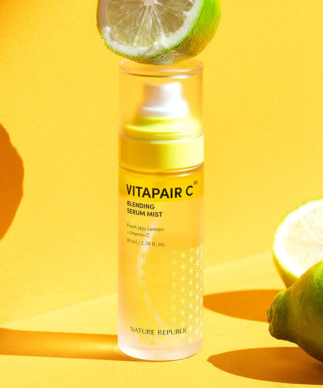 NATURE REPUBLIC Vitapair C Blending Serum Mist 80ml with fresh lemon scent displayed against a vibrant yellow background