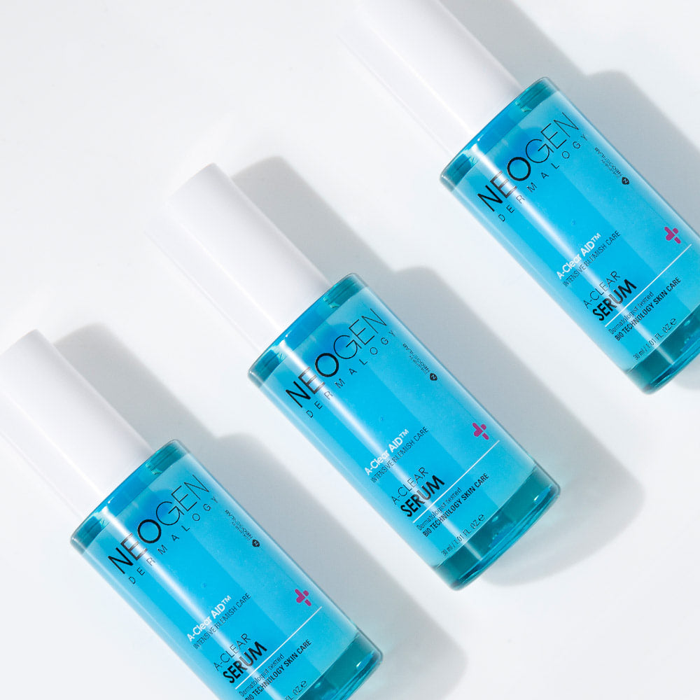 NEOGEN A Clear Serum 30ml bottles arranged in a row, showcasing the product's packaging and size.
