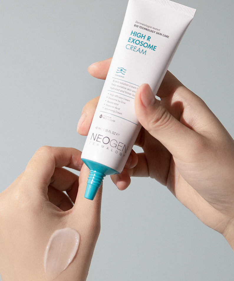 Applying NEOGEN Hyal Exosome Cream 40ml on hand for skincare hydration