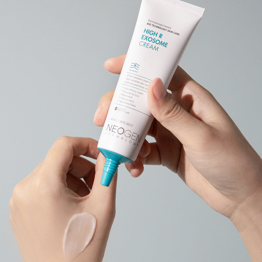 Applying NEOGEN Hyal Exosome Cream 40ml on hand for skincare hydration
