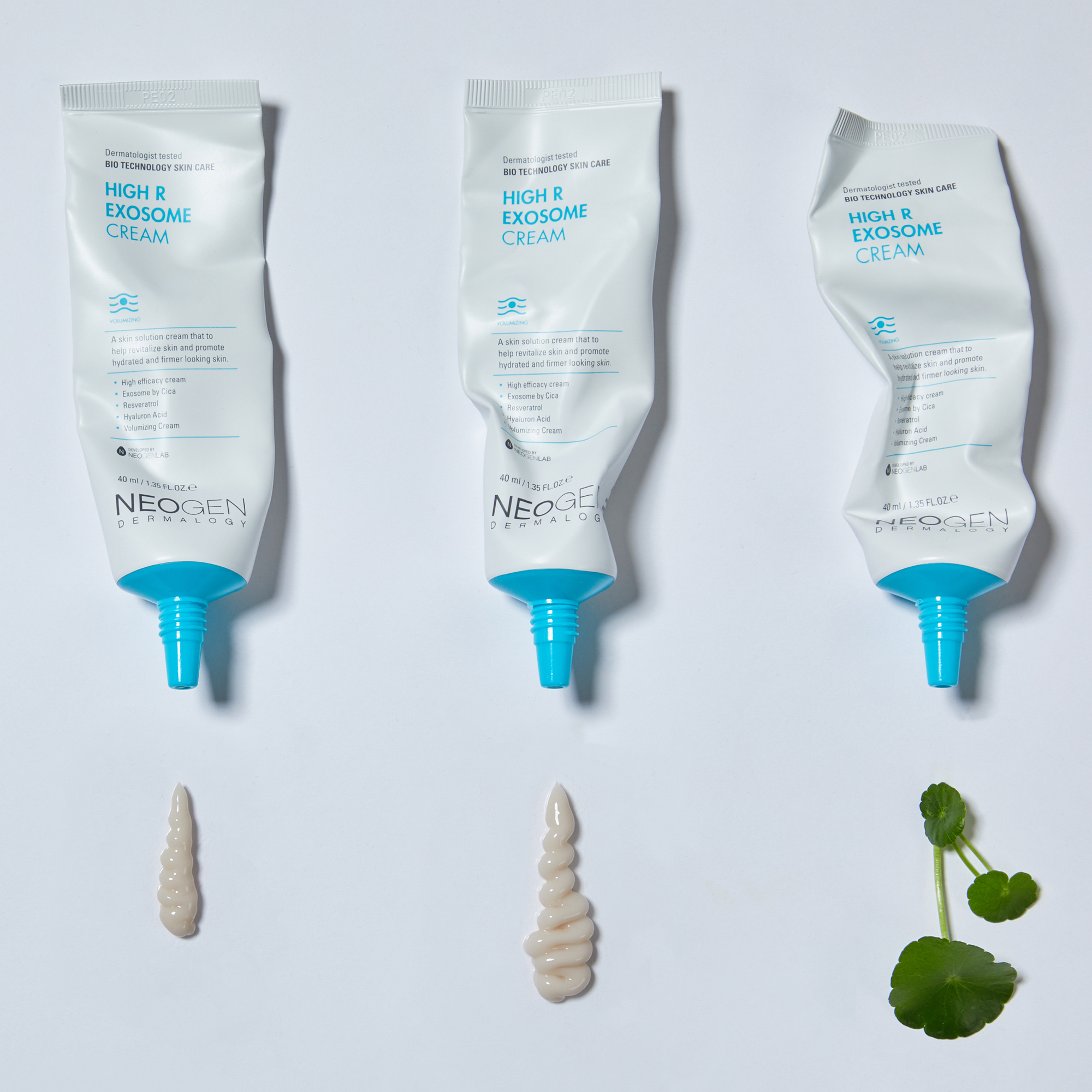 Three tubes of NEOGEN Hyal Exosome Cream 40ml dispensed on white surface, enhancing skin texture.