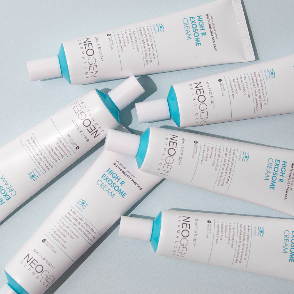 Six tubes of NEOGEN Hyal Exosome Cream 40ml arranged on a flat surface, highlighting skincare packaging.