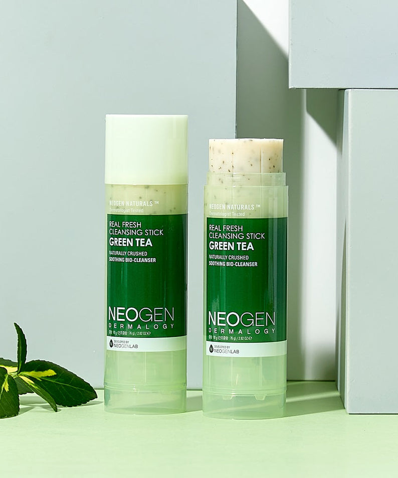 Image of NEOGEN Real Fresh Cleansing Stick Green Tea 80g with green tea leaves.