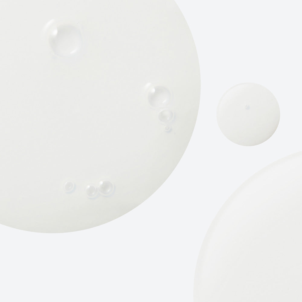 Texture of NEOGEN Real Heartleaf Soothing Essence 150ml showing clear liquid with bubbles