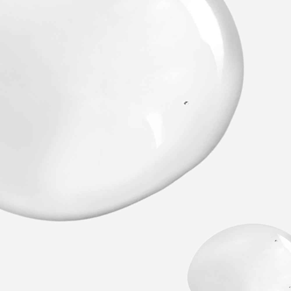 Texture of NEOGEN Real Niacinamide 15% Serum 30ml on a light background