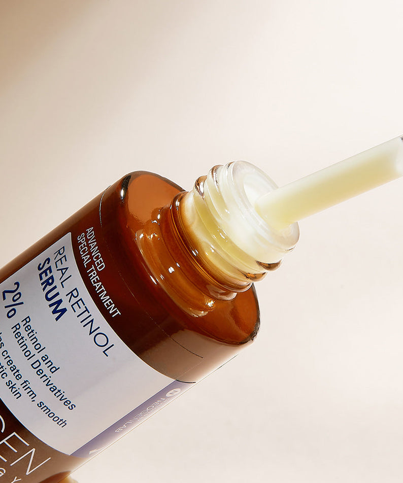 Close-up of NEOGEN Real Retinol Serum 30ml with dropper, showcasing skincare serum texture and packaging design.