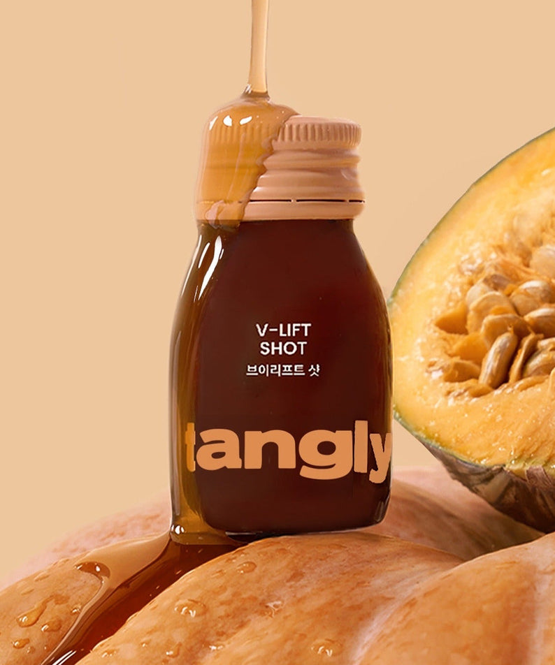 NOTHING BETTER Tangly V-Life Shot 7 Bottles displayed with pumpkin, highlighting the product's natural ingredients.