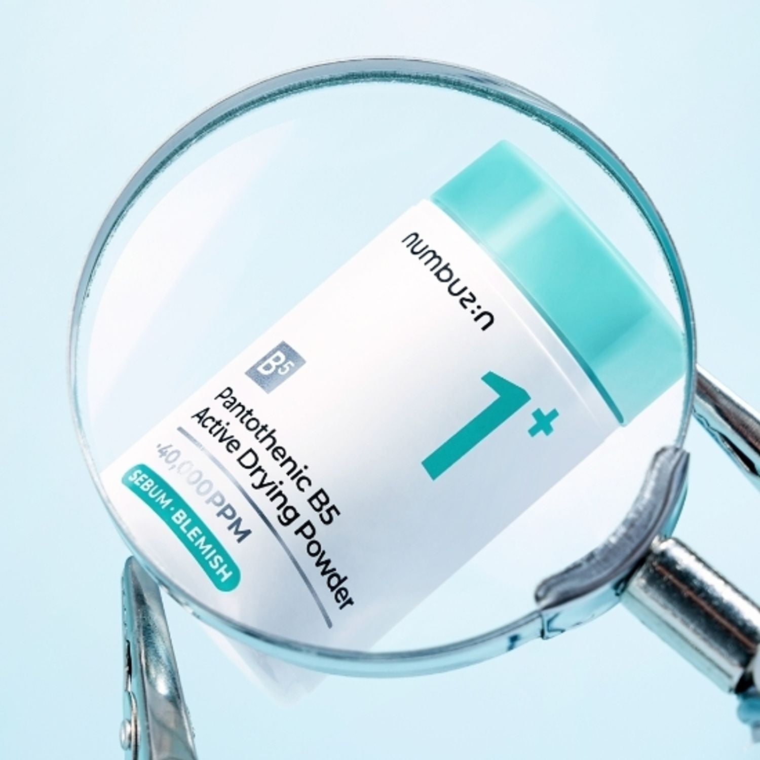 NUMBUZIN No.1 Pantothenic Acid Active Up Dressing Powder 7g under magnifying glass, highlighting product details and packaging.