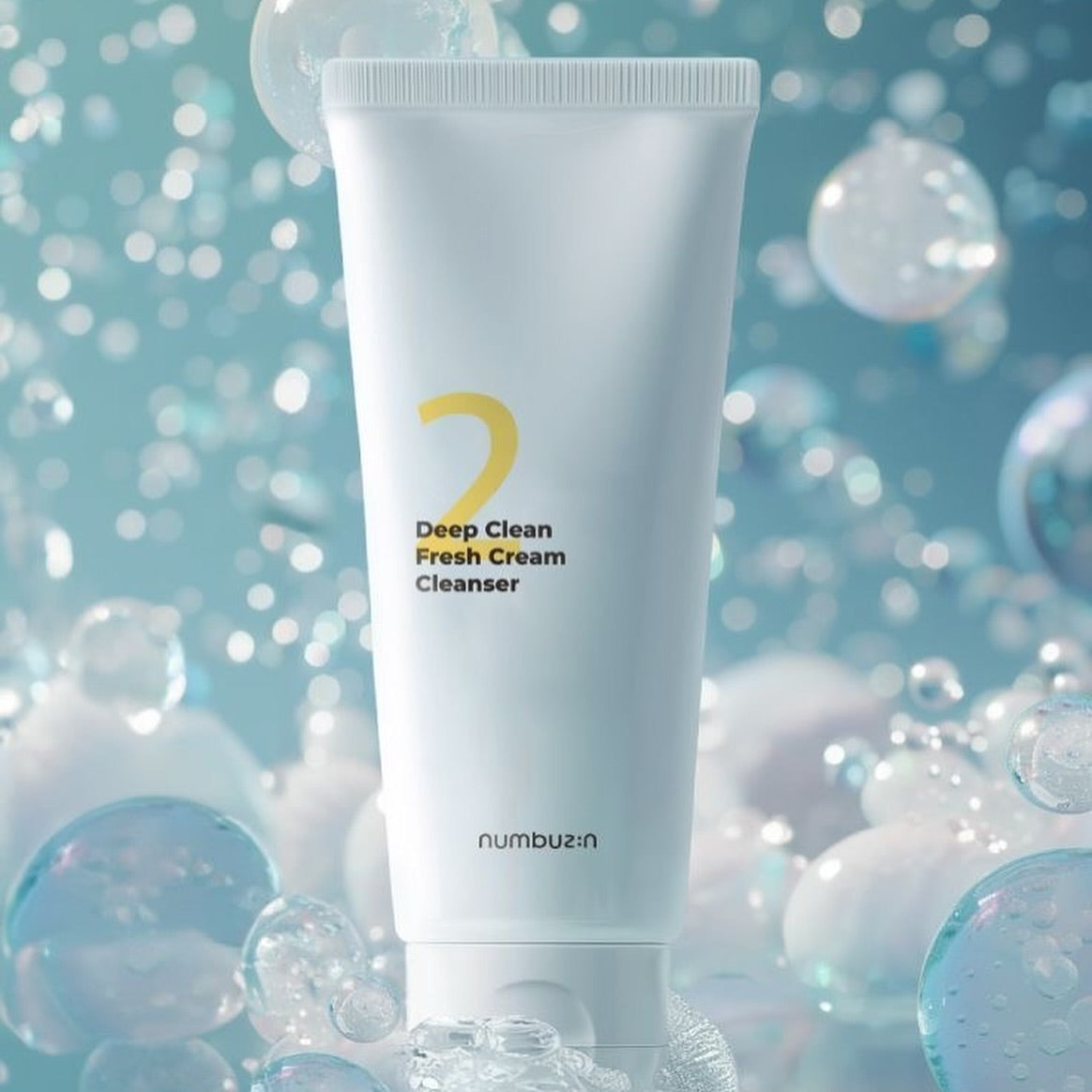 Image of NUMBUZIN No.2 Deep Clean Cream Cleansing Foam 120ml with fresh bubbles background.
