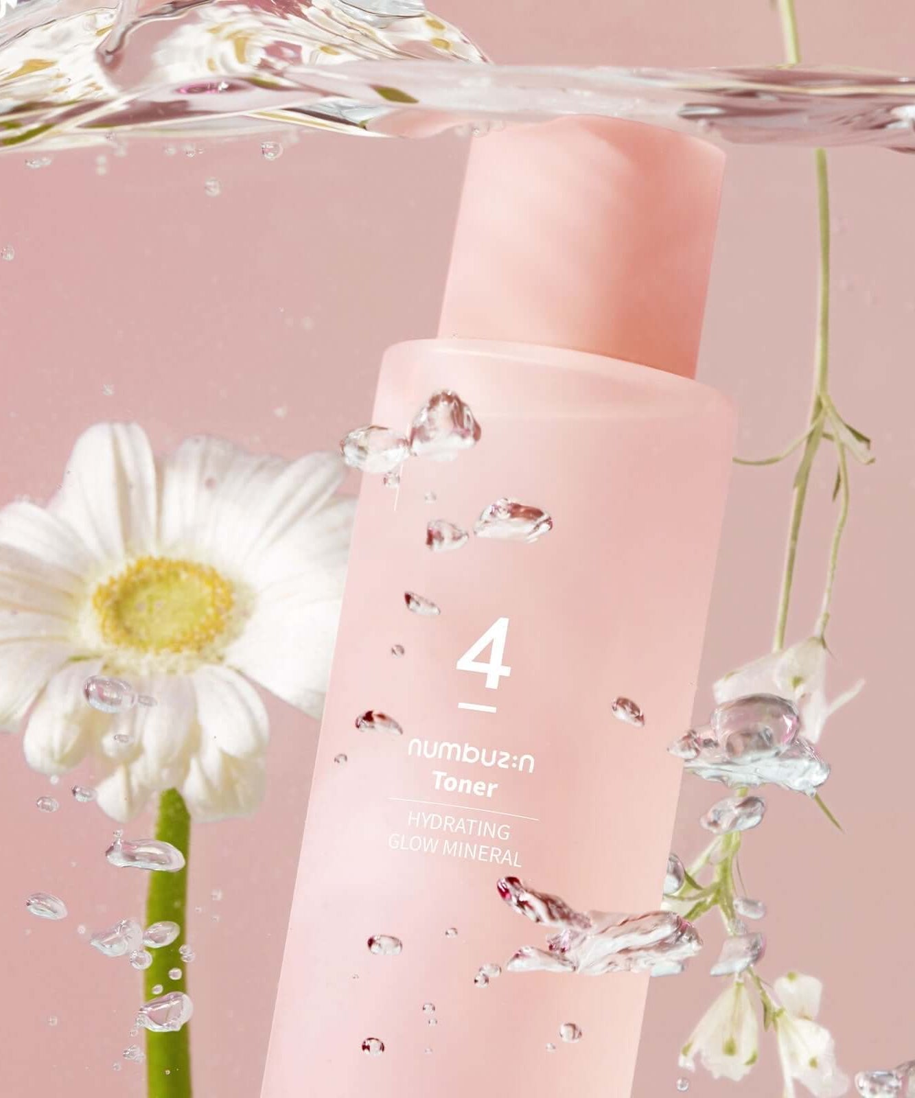 NUMBUZIN No.4 Hydration Glow Mineral Toner bottle with floral background and water droplets for refreshing skincare routine