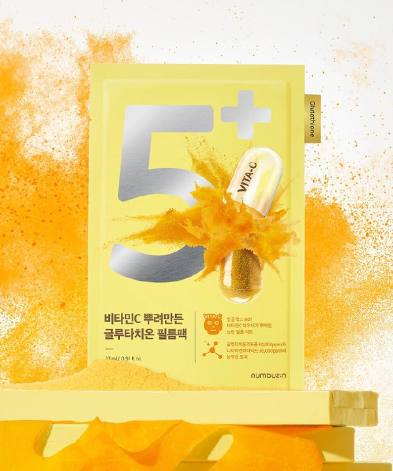 NUMBUZIN No.5 Vitamin Spotlight Sheets Mask with vibrant packaging and vitamin powder burst in the background.