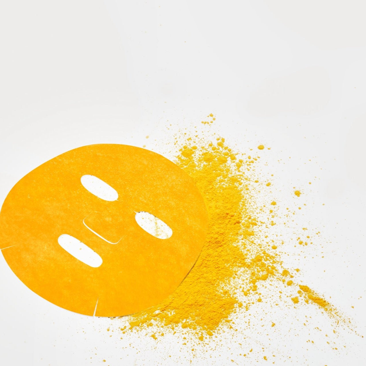 NUMBUZIN No.5 Vitamin Spotlight Sheets Mask with vibrant yellow color and powder on a white background.