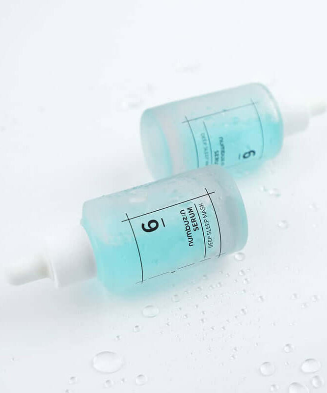 Two bottles of NUMBUZIN No.6 Deep Sleep Mask Serum with droppers, designed to hydrate and nourish skin overnight.