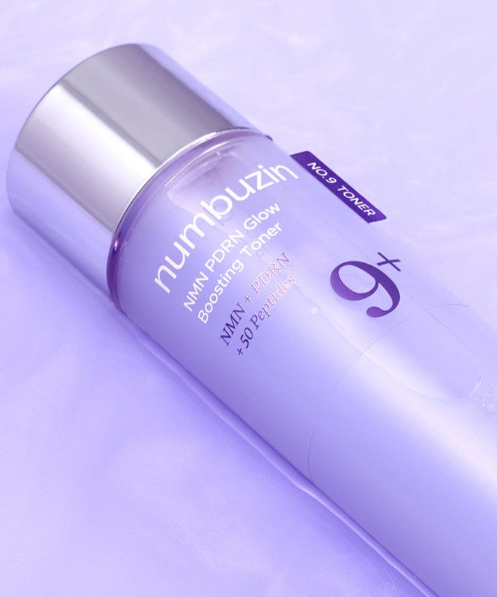 NUMBUZIN No.9 NMN PDRN Glow Boosting Toner 150ml bottle on purple background.