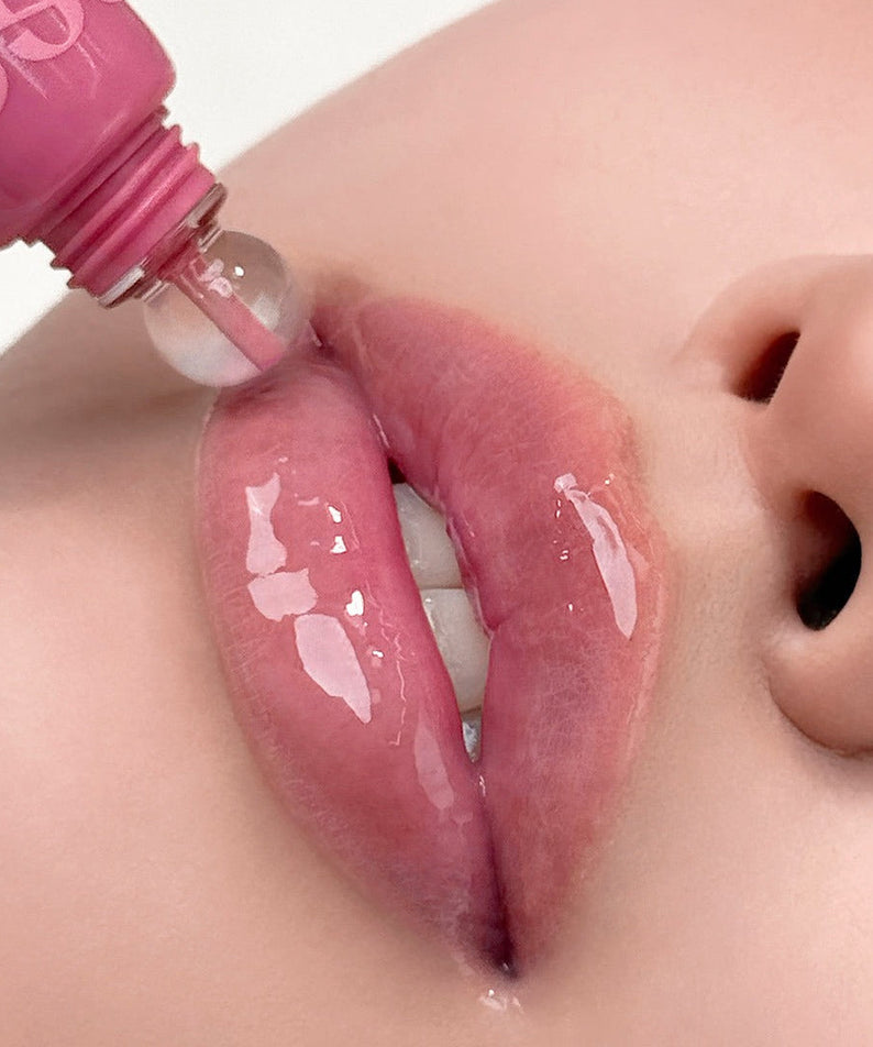 NUSE Nuzzle Reju Lip Gloss applied to lips for a glossy finish
