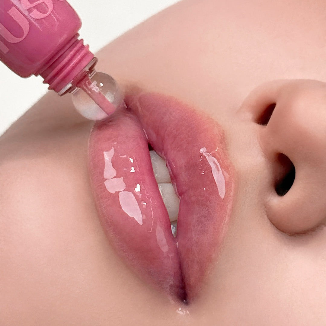 NUSE Nuzzle Reju Lip Gloss applied to lips for a glossy finish