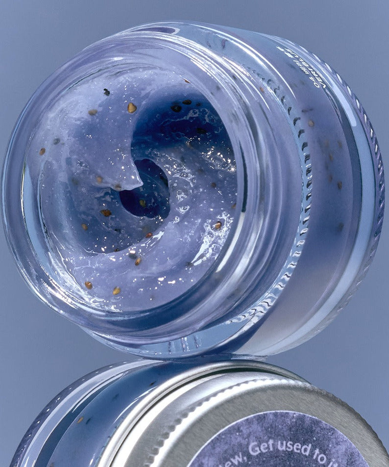 Open jar of NUSE Seed Care Lip Scrub showcasing its textured formula.
