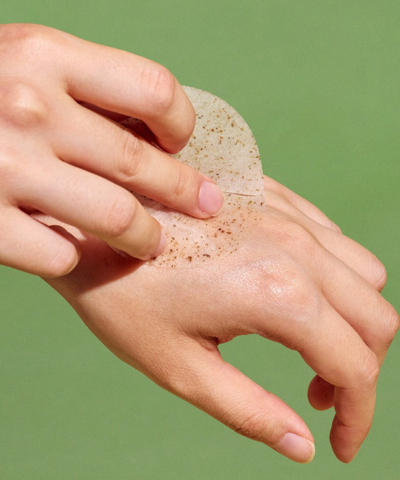 Applying NUTSELINE Cica Calming Pad to skin for soothing and calming effects