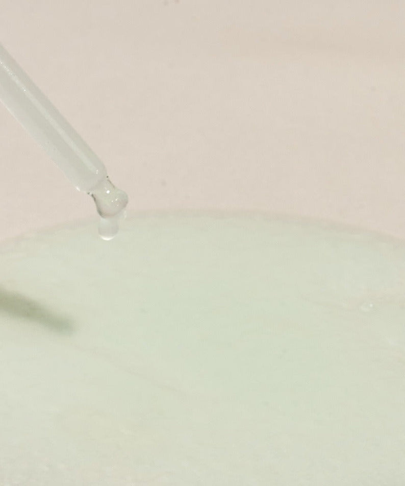 Close-up of NUTSELINE Cica Nut Hyal Ampoule 90ml serum with dropper showcasing texture