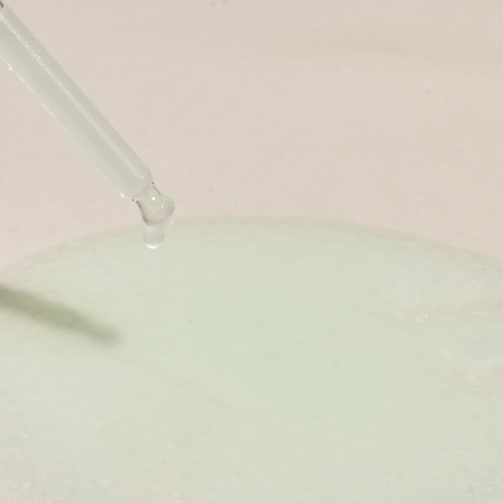 Close-up of NUTSELINE Cica Nut Hyal Ampoule 90ml serum with dropper showcasing texture