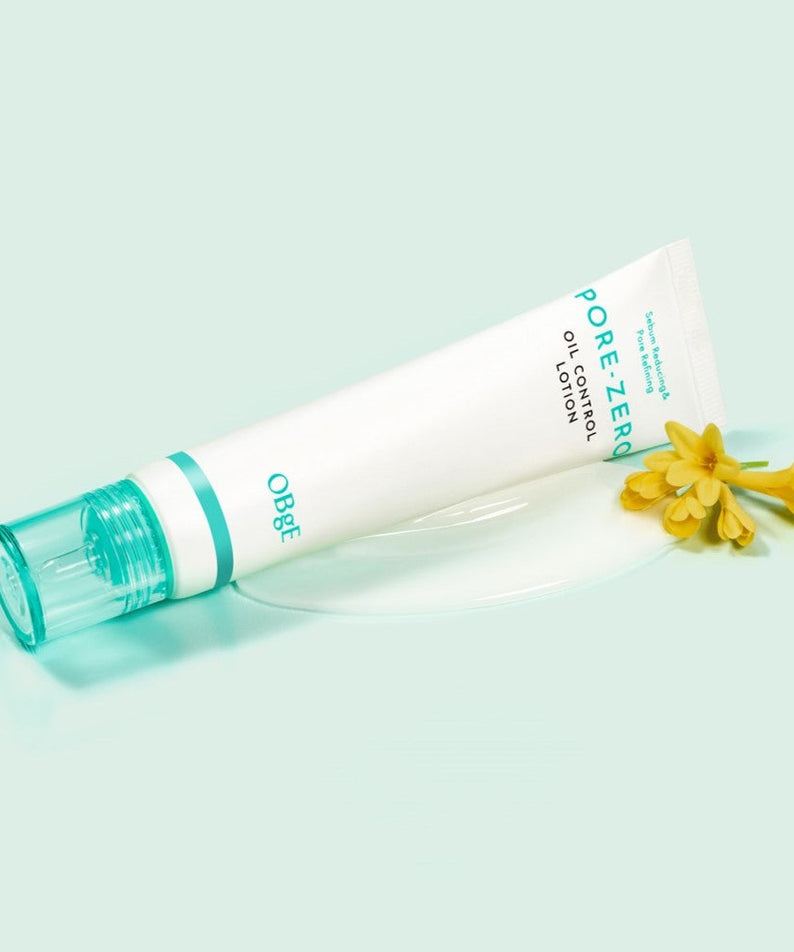 OBGE Pore Zero Oil Control Lotion 70ml product shot by Gentleman Korea, men's Korean skincare tube on mint background with yellow flowers