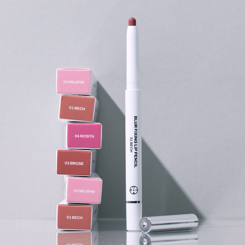 OIAD Blur Fixing Lip Pencil next to various lipstick shades in a sleek design