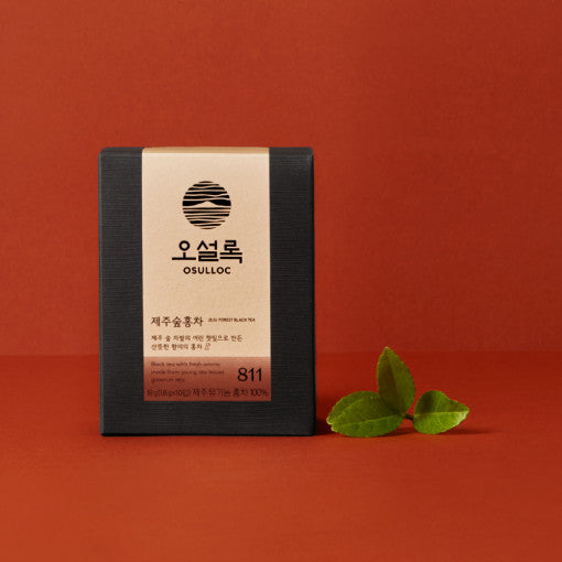 OSULLOC Jeju Forest Black Tea 10p package with green leaves on a red background