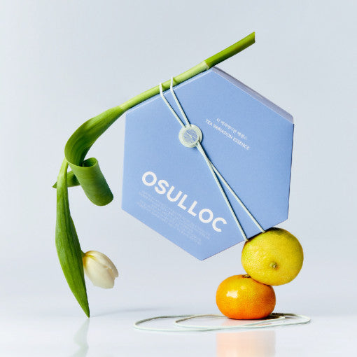 OSULLOC Tea Variation Essence 42p Set packaging with flower and citrus fruits displayed elegantly.