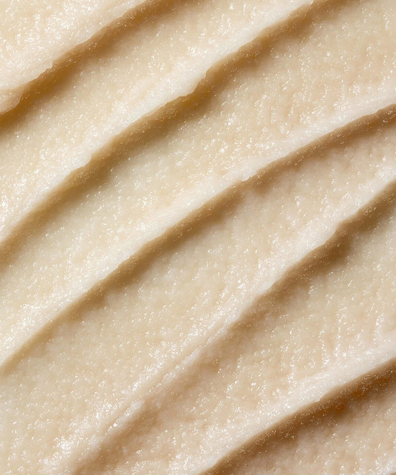 Close-up texture of PARNELL AHA Omija Ceramic Bubble Peeling Cleanser 180ml skincare product.