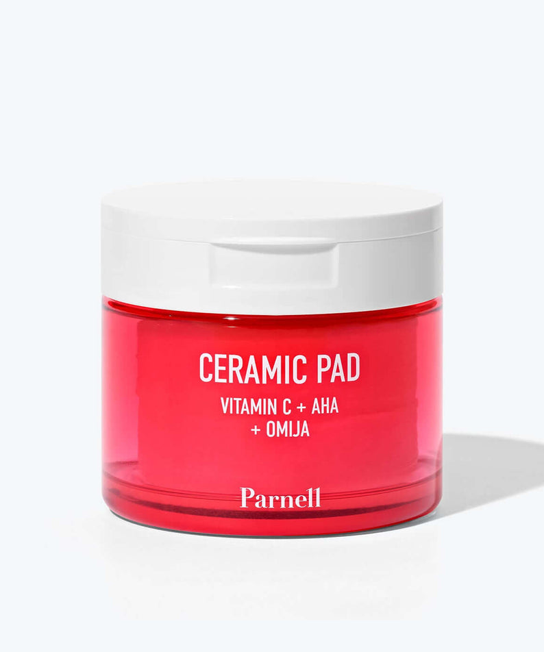PARNELL AHA Omija Ceramic Pad 60 Pads in red jar with white lid showcasing skincare product