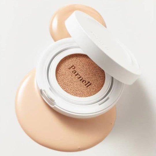 Open PARNELL Cicamanu Serum Cushion 15g showcasing its texture and color against a neutral background.