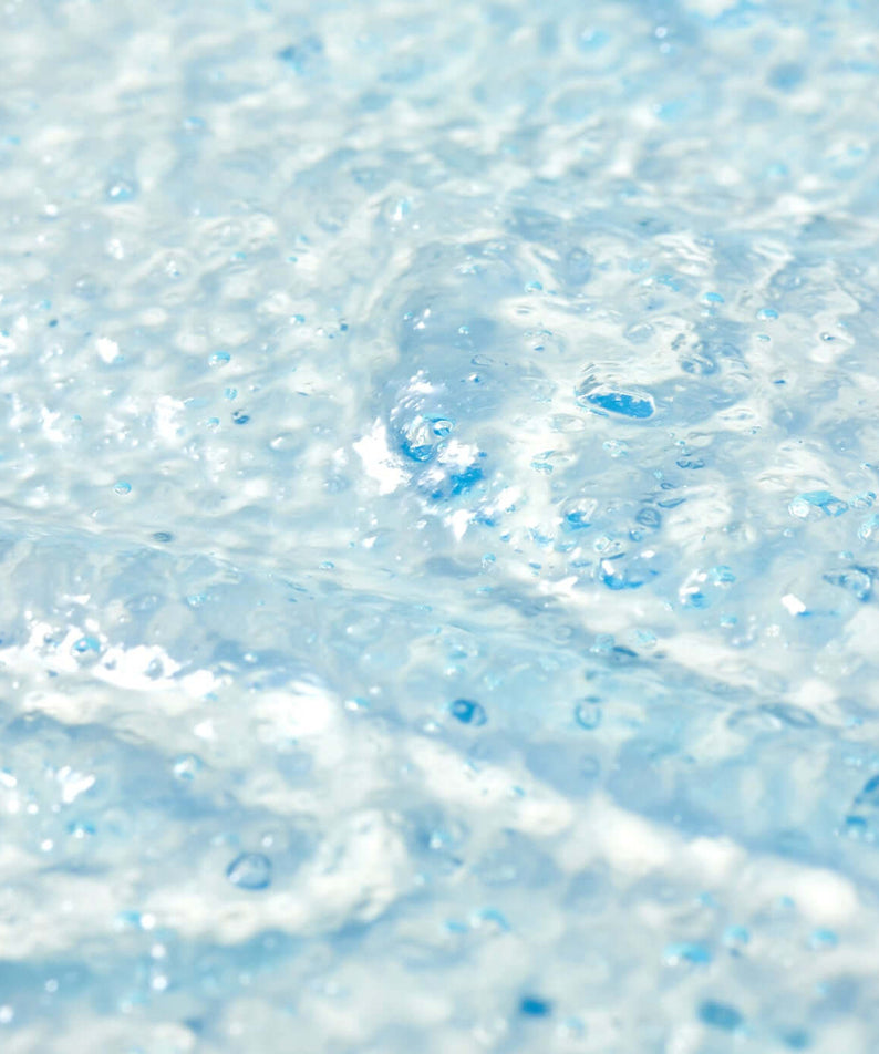 Close-up texture of PARNELL Squalane Mineral Water Moisture Capsule Toner 200ml highlighting its hydrating properties