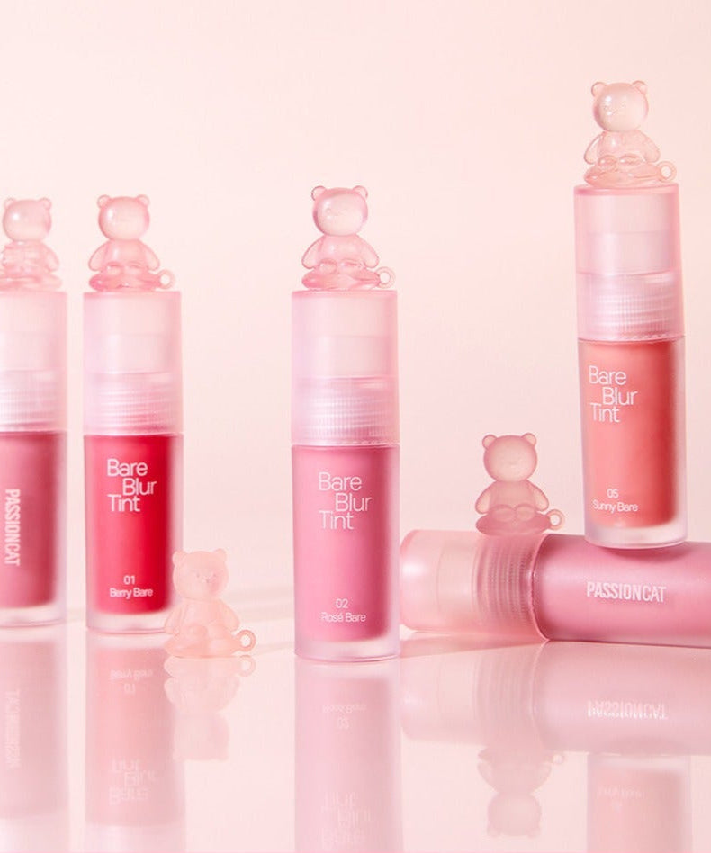 PASSION CAT Bere Blur Tint in various shades with bear design, showcasing premium lip color options.