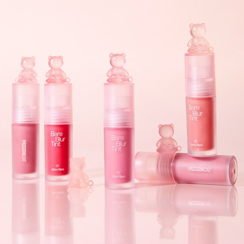PASSION CAT Bere Blur Tint in various shades with bear design, showcasing premium lip color options.