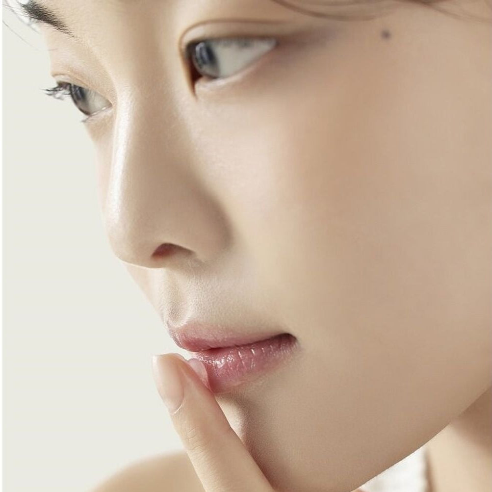 Close-up of a person showcasing smooth lips, ideal for PASSION&BEYOND Angel Aqua Moisture Plumping Lipcarin 15ml product.