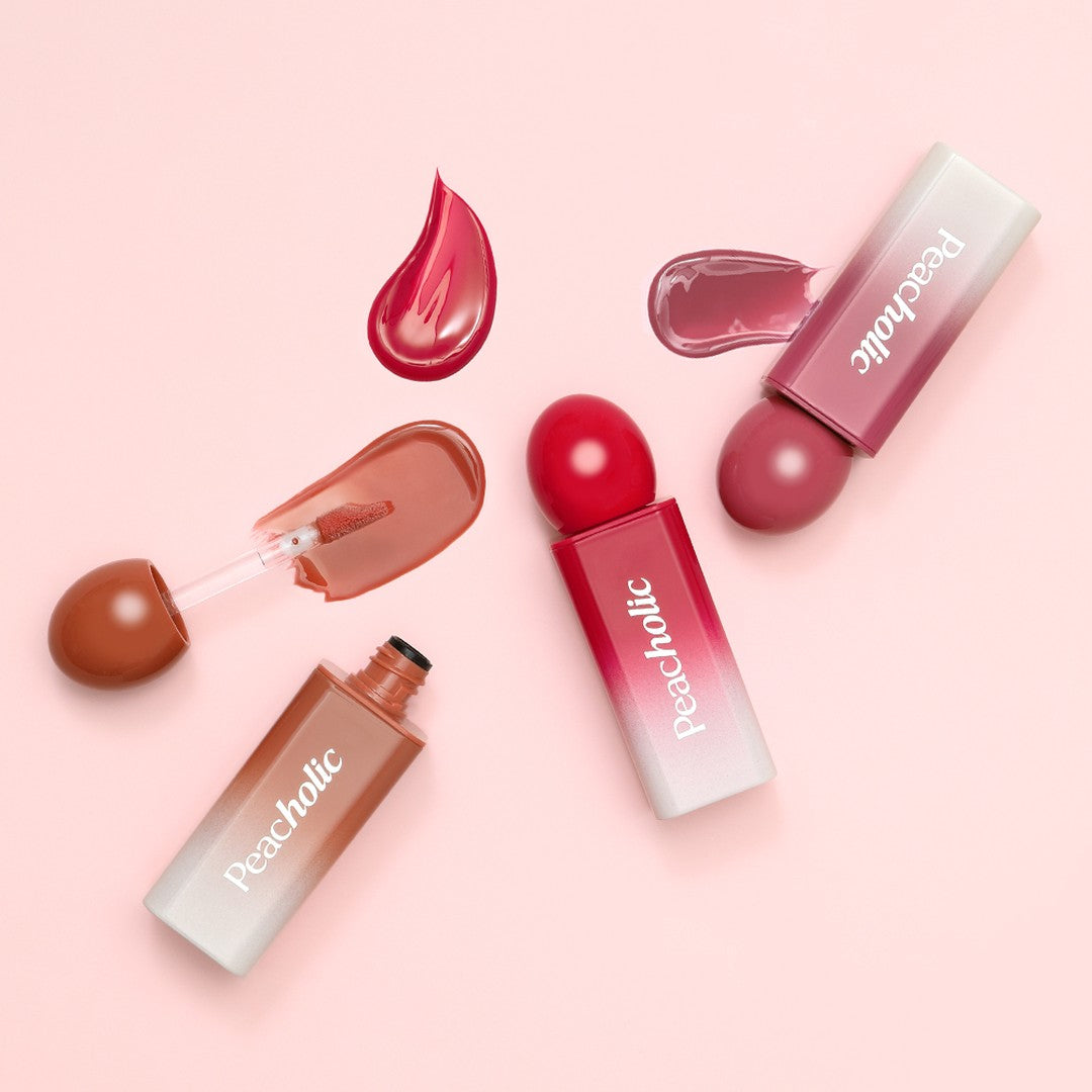 PEACHOLIC Water Glow Lip Tint in various shades on a pink background, showcasing vibrant color options and glossy texture.