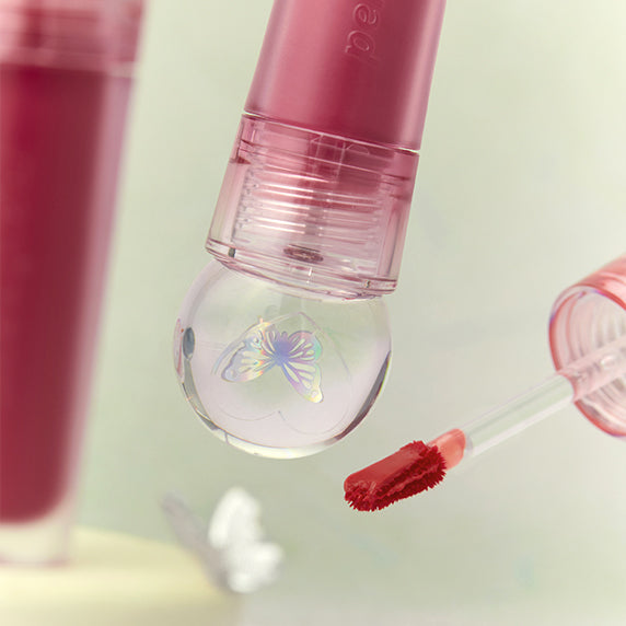 PERIPERA Ink The Jellable Tint in pink shade with applicator and butterfly design cap.