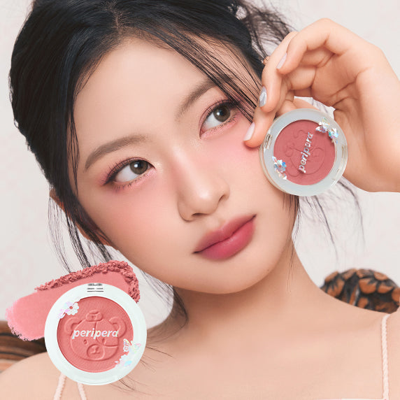 Model using PERIPERA Pure Blushed Sunshine Cheek makeup for a flawless look
