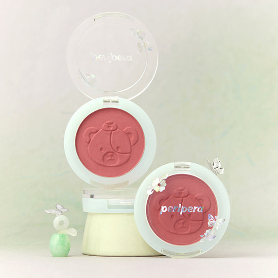 PERIPERA Pure Blushed Sunshine Cheek blushes with embossed design, featuring colorful decorative elements, displayed in open compacts.