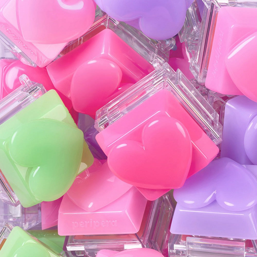 Colorful PERIPERA Talk Blush Keycap compacts with heart shapes, showcasing vibrant pink, green, and purple shades.