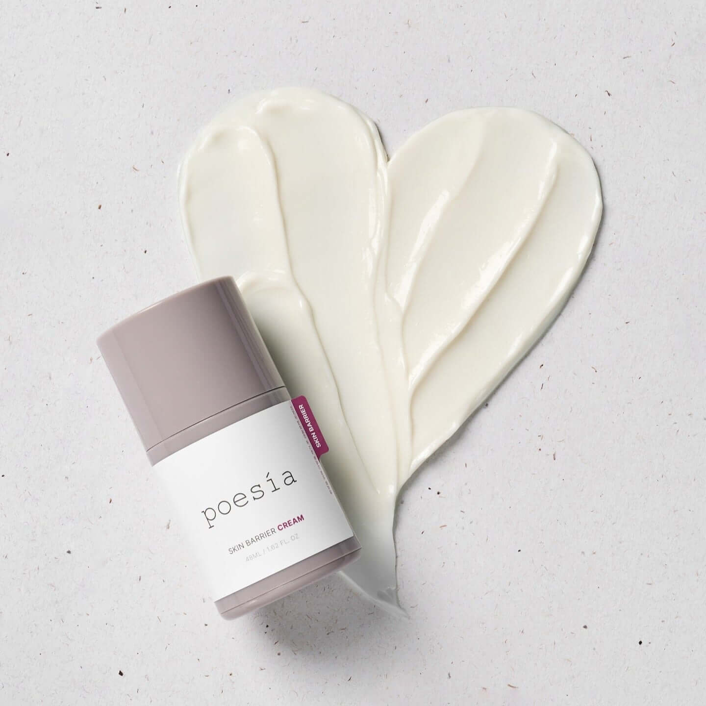 POESÃA Ceramide 3 Liposome Intensive Skin Barrier Cream 48ml next to heart-shaped cream smear
