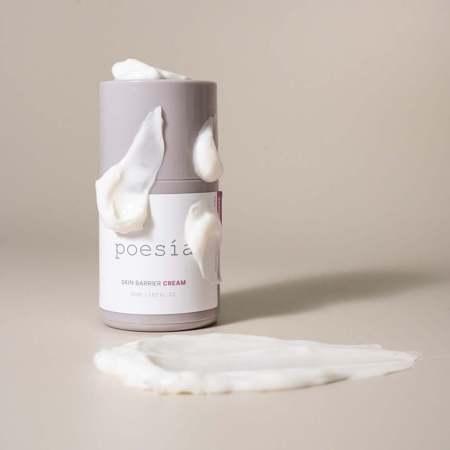 POESÃA Ceramide 3 Liposome Intensive Skin Barrier Cream 48ml bottle with cream swirls on a neutral background