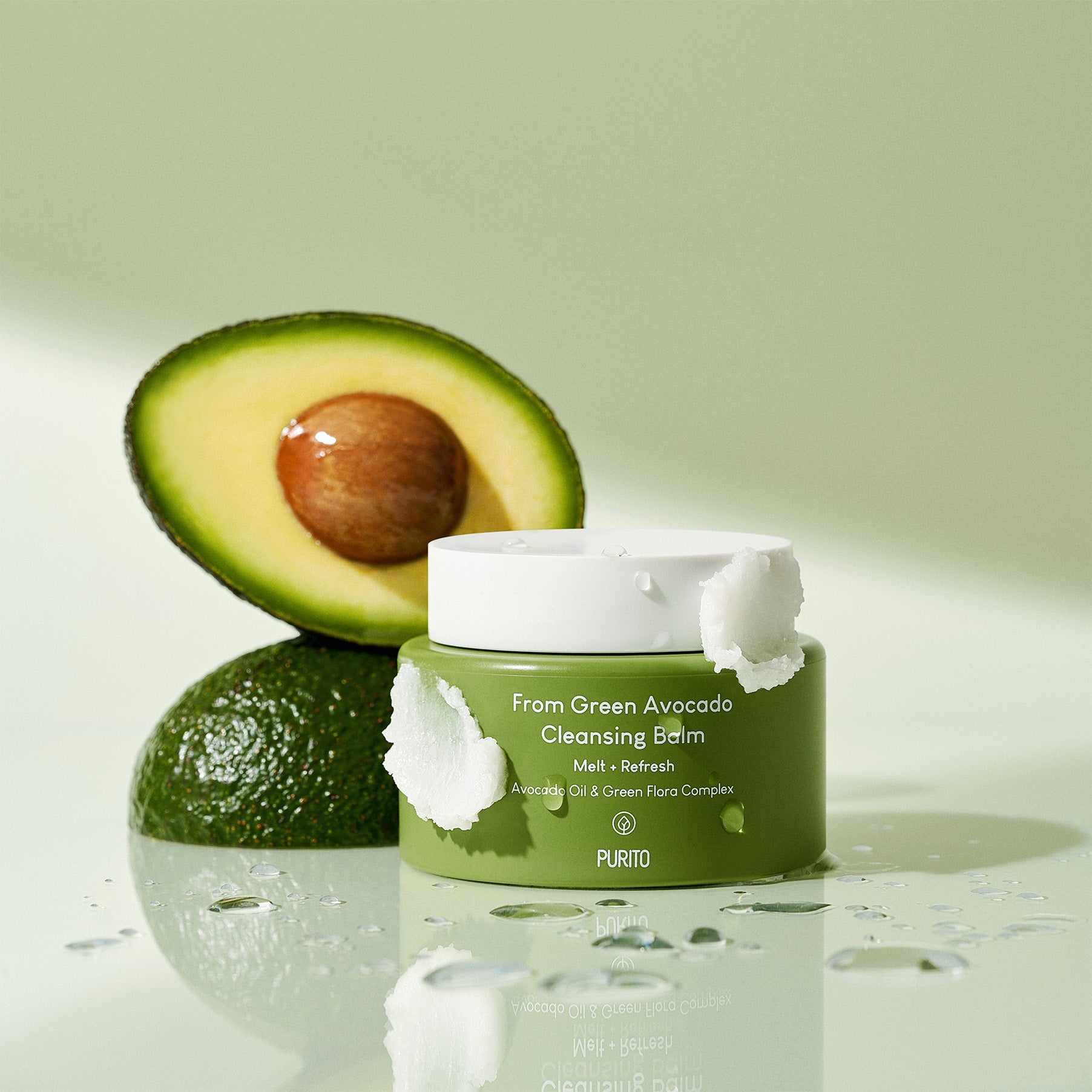 PURITO From Green Avocado Cleansing Balm 100ml displayed with fresh avocado in background.