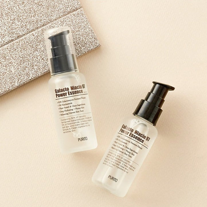 PURITO Galacto Niacin 97 Power Essence 60ml bottles on a neutral background for skincare promotion