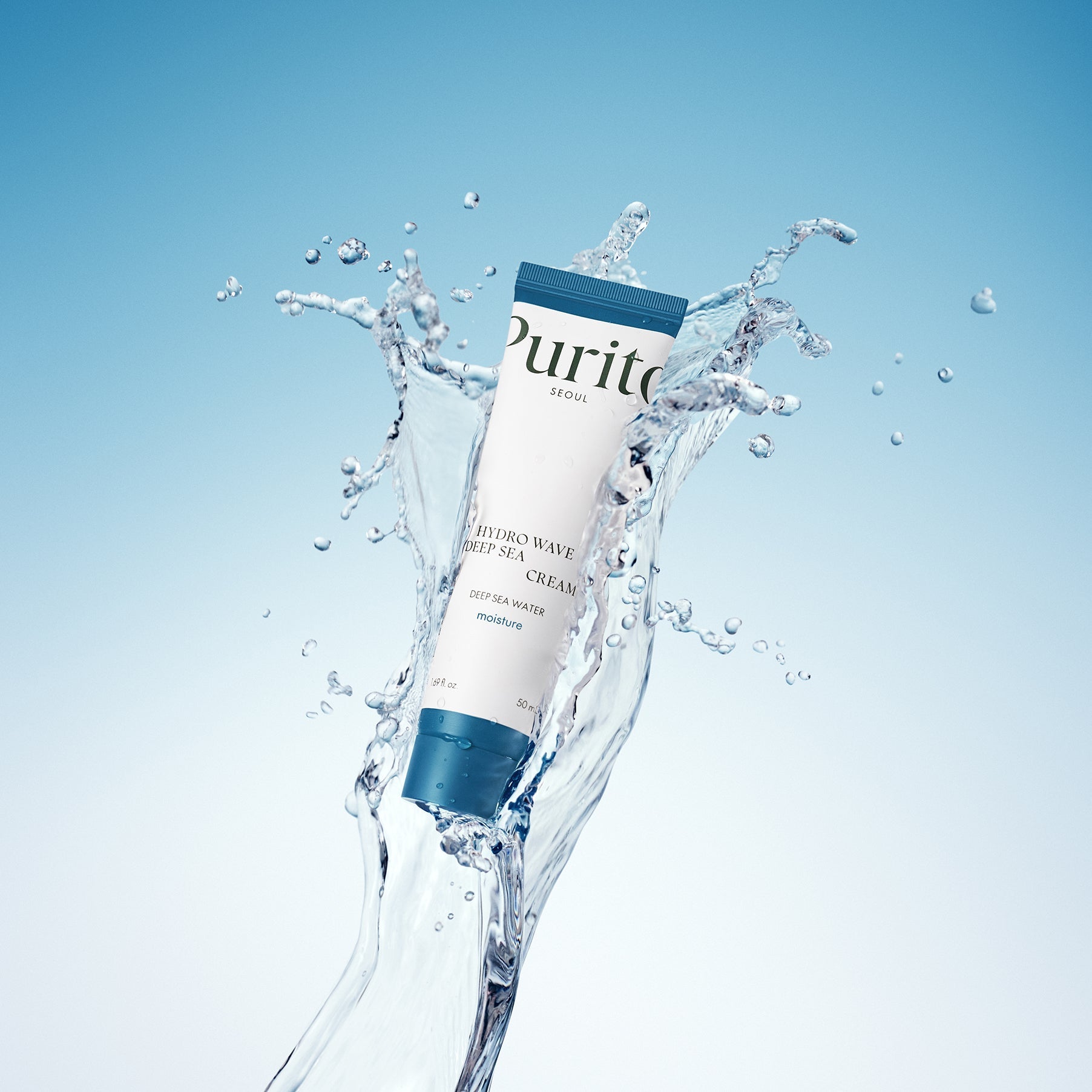 PURITO Hydro Wave Deep Sea Cream 50ml surrounded by splashes of water on a blue background, highlighting hydration and freshness.