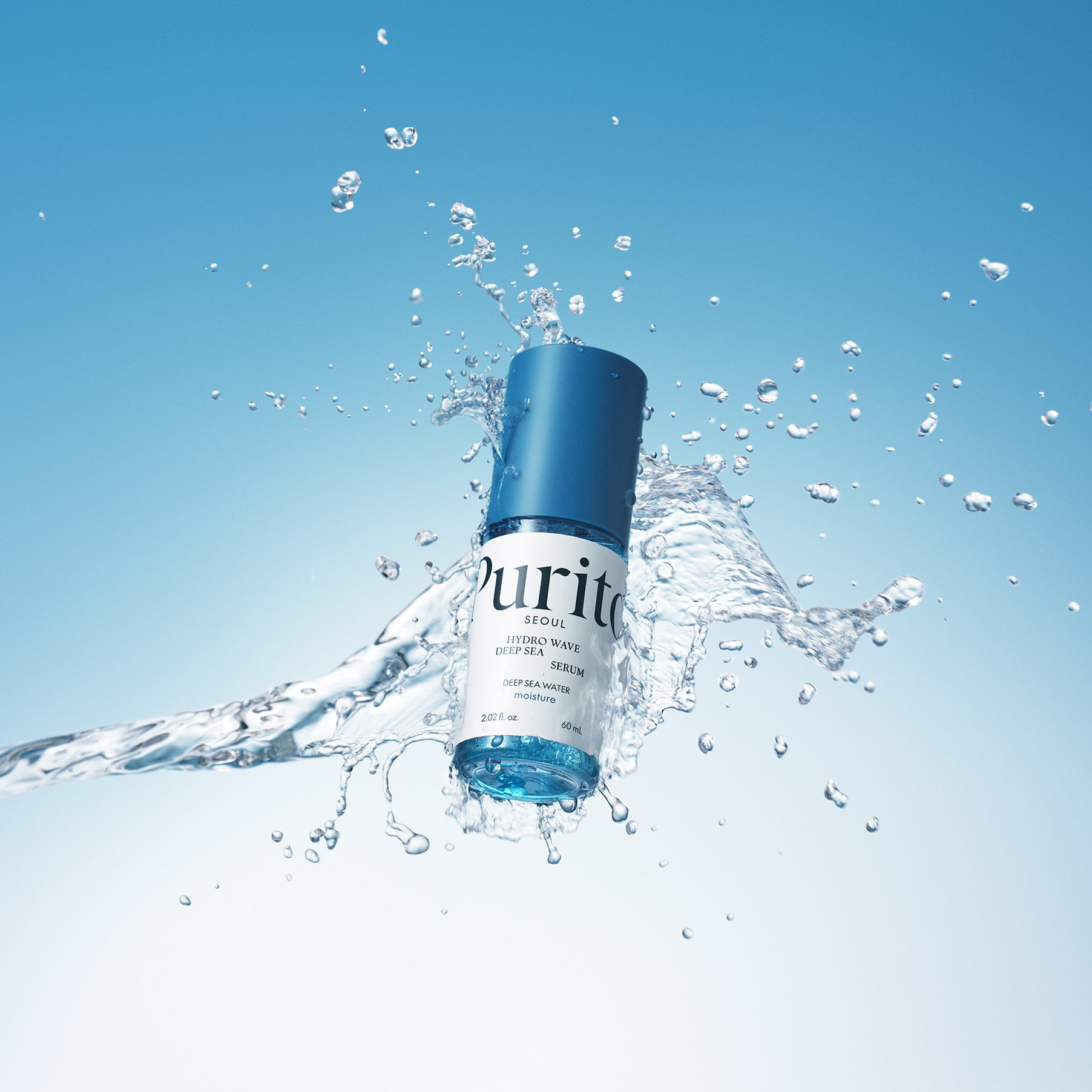 PURITO Hydro Wave Deep Sea Serum 60ml amidst splashing water with blue background