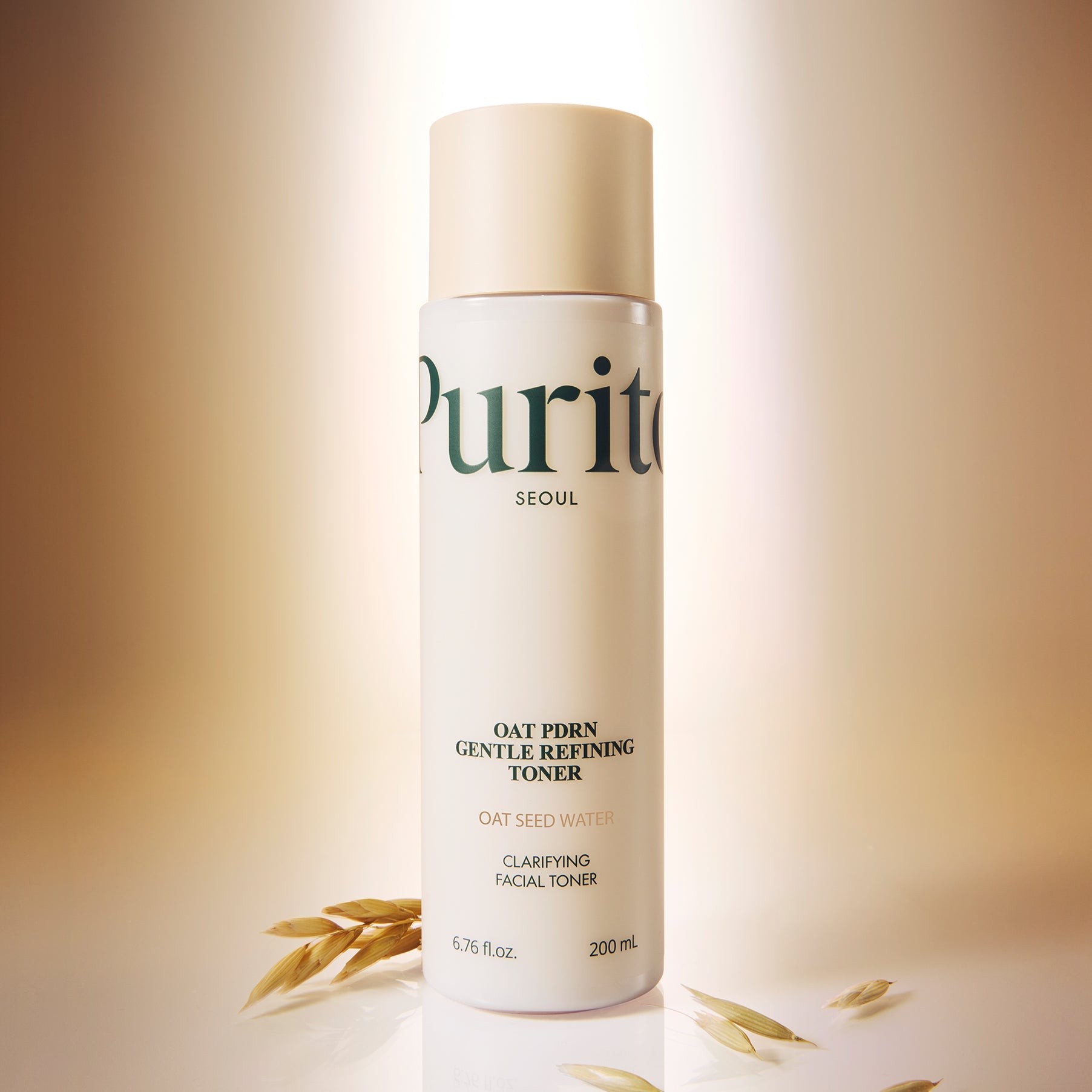 PURITO Oat PDRN Gentle Refining Toner 200ml bottle with oat grains on a light background